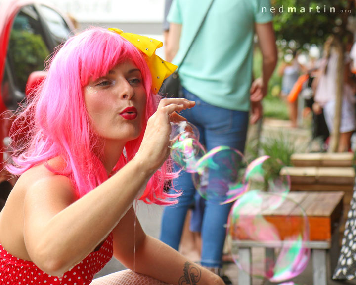 Miss Bubbles blows bubbles at the Paddington Christmas Fair