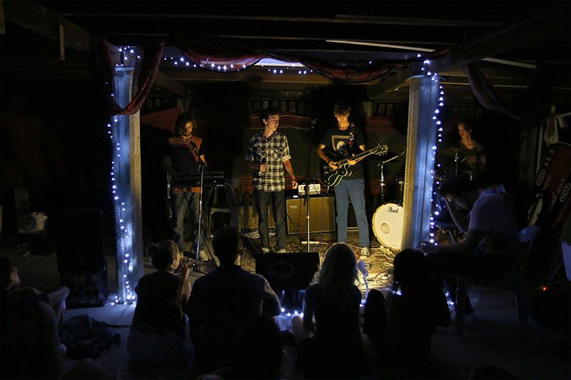A band performs for Roving Conspiracy