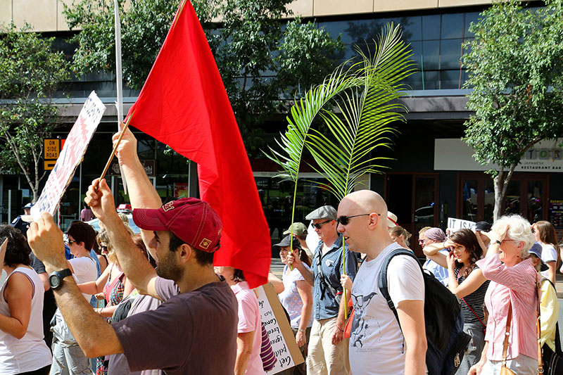 Communists and Christians march together