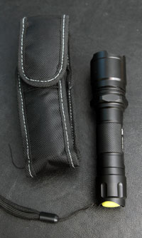 P-Rocket torch and its holster. Note glow-in-the-dark switch