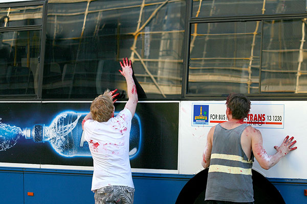 Zombies attack a passing bus