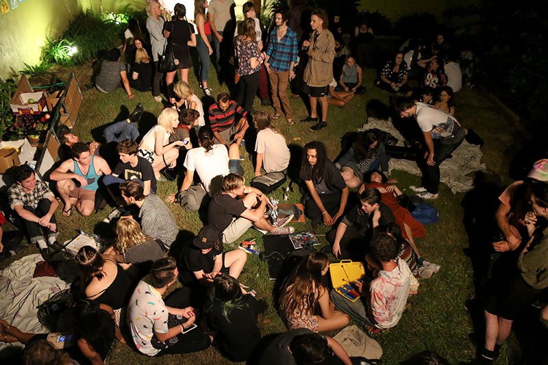 A mellow crowd in the backyard at 42 Mollison Street
