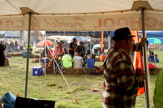 An afternoon rain shower, seen from within the merch tent