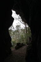 Ned outside a cave on the way to The Steamers