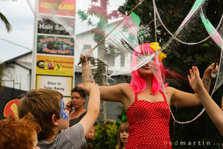 Popping Miss Bubbles’ bubbles at the Paddington Christmas Fair