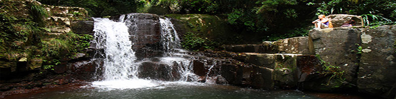 Bronwen and a waterfall on the Coomera Circuit.