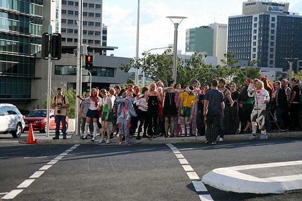 The zombies wait patiently for the little red man to go green