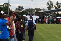 Police trying to keep the field open, World Refugee Day