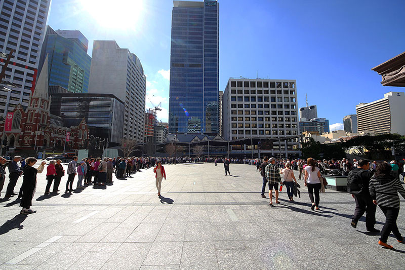 The immense queue of people waiting to get into City Hall