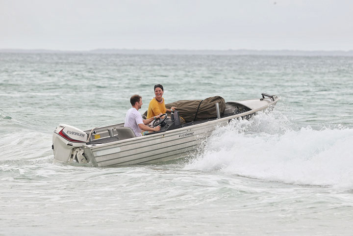 Carissa and Ben leaving in a boat, Stradbroke Island