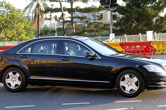 This is what VIPs looked like in their limousines. Here we have Ahmet Davutoğlu, Turkish Prime Minister, waving