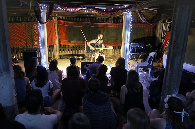 A guitarist performs at Roving Conspiracy