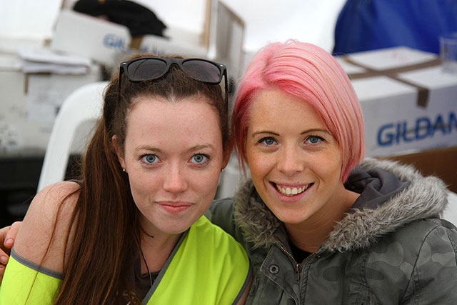 Tully and Leah in the merch tent, keeping everything going