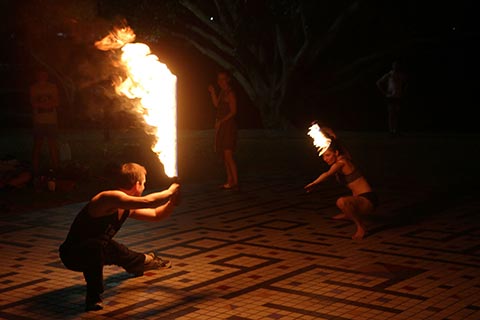 Fire sword play at Sunset Gathering