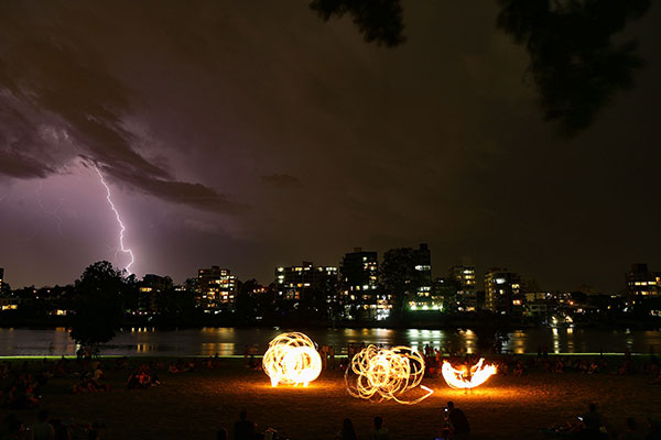 Lightning and fire twirlers at West End Fire Festival