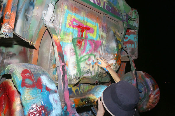 Bronwen adding a B to the Cadillac Ranch