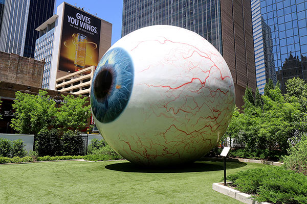 A rather large eyeball keeps watch on things in Dallas