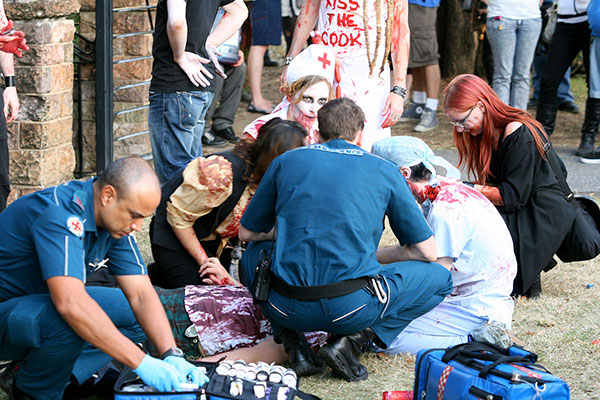 Zombies and paramedics tend to the wounded