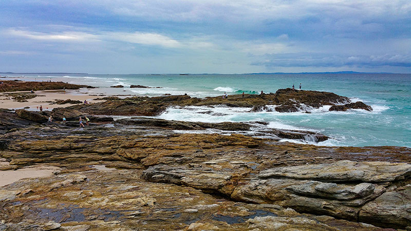 Rocks covered in people