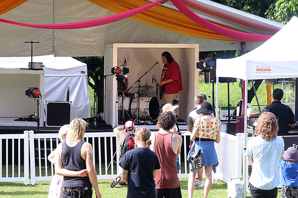 A man plays in a small box