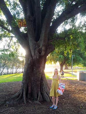 Bronwen investigating art in a tree at Orleigh Park