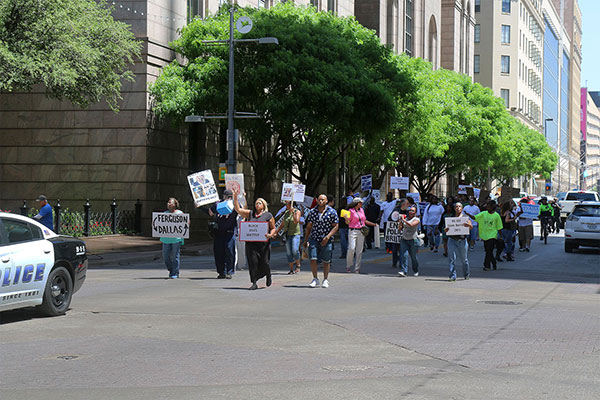 “Don’t shoot” protesters