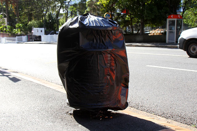 A terrorist rubbish bin lurking suspiciously outside the gate