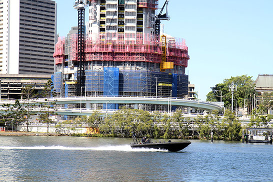 A police boat patrols the Brisbane River