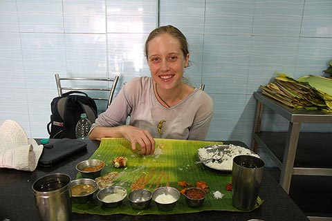 Bronwen eating a banana leaf thali