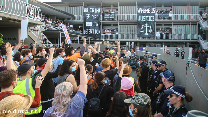 The crowd almost breaks down the fence