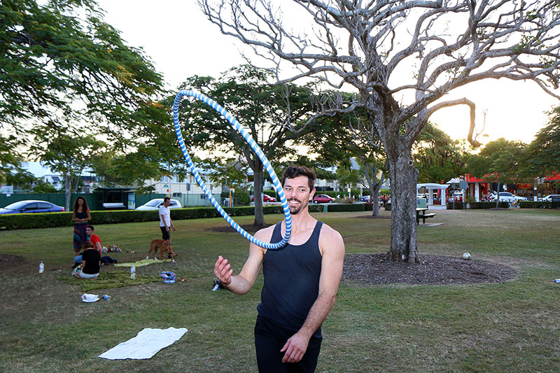 A man levitating a hoop