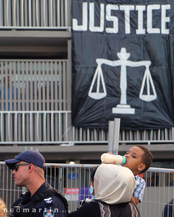 The mother and son get to within a few metres of the refugee