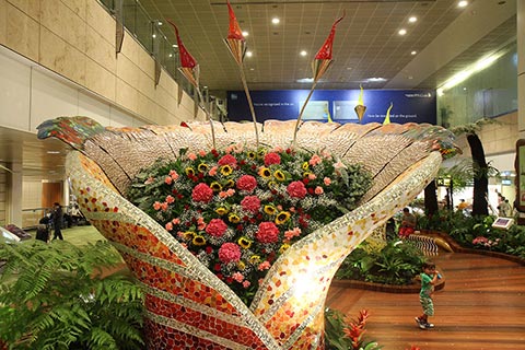 Changi Airport’s “Enchanted Garden”–electrically animated flowers come to life, moving & making sounds