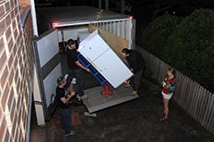 Maz removing a fridge
