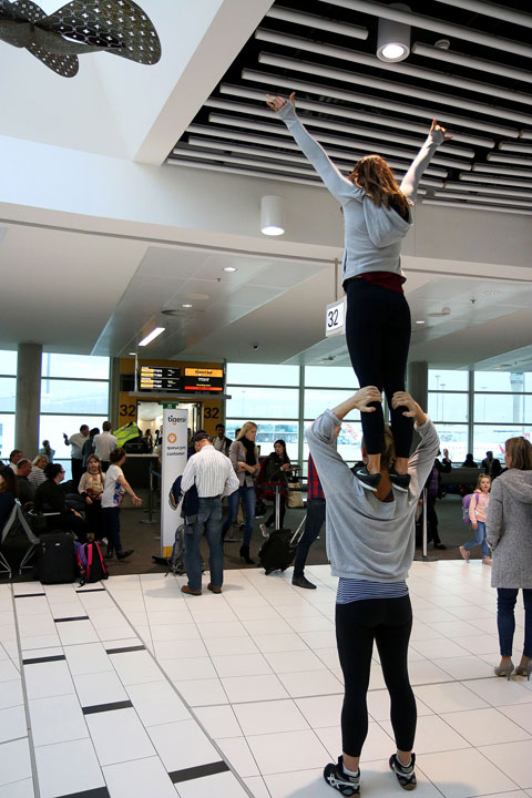Sophia demonstrating airport etiquette for short people