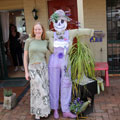 Bronwen with a scarecrow at Tamborine Mountain Scarecrow Festival