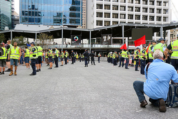 Police enforce a no-mans land between the two sides