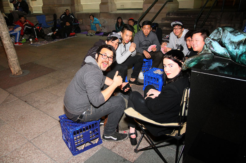 Playing cards while waiting for the Apple Store to open