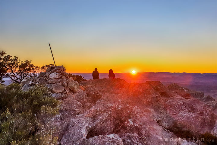 Bronwen & Carissa watching the sun rise from Mt Maroon