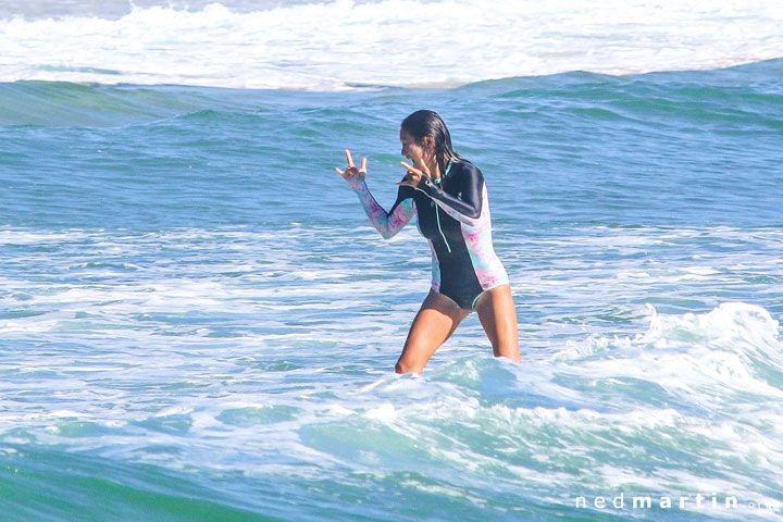 Wendy practicing surfer-sign-language