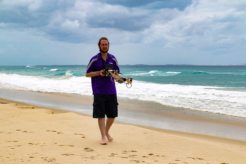 Maz flies along the beach