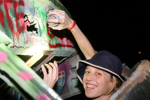 Bronwen defacing the Cadillac Ranch