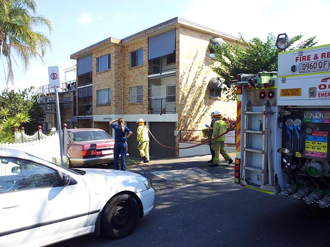 Fire engine starts to put out fire