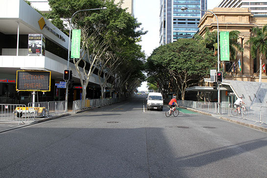 One of the few cars brave enough to drive through the city, where it will probably be stopped for a long time when it runs into a road closed for a motorcade