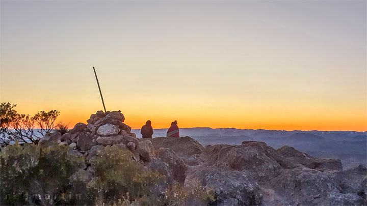 Bronwen & Carissa watching the sun rise from Mt Maroon