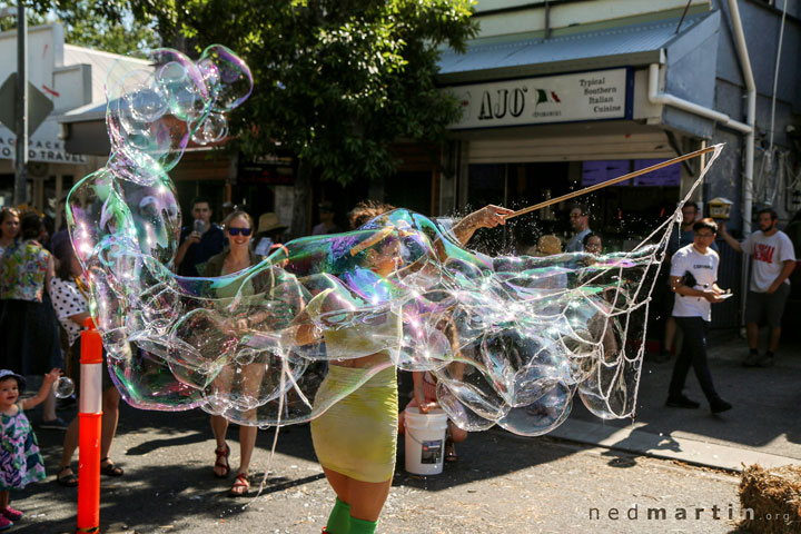 Carissa blowing bubbles, Kurilpa Derby, West End