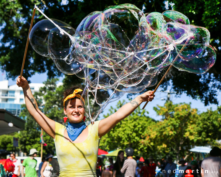 Carissa blowing bubbles, Kurilpa Derby, West End