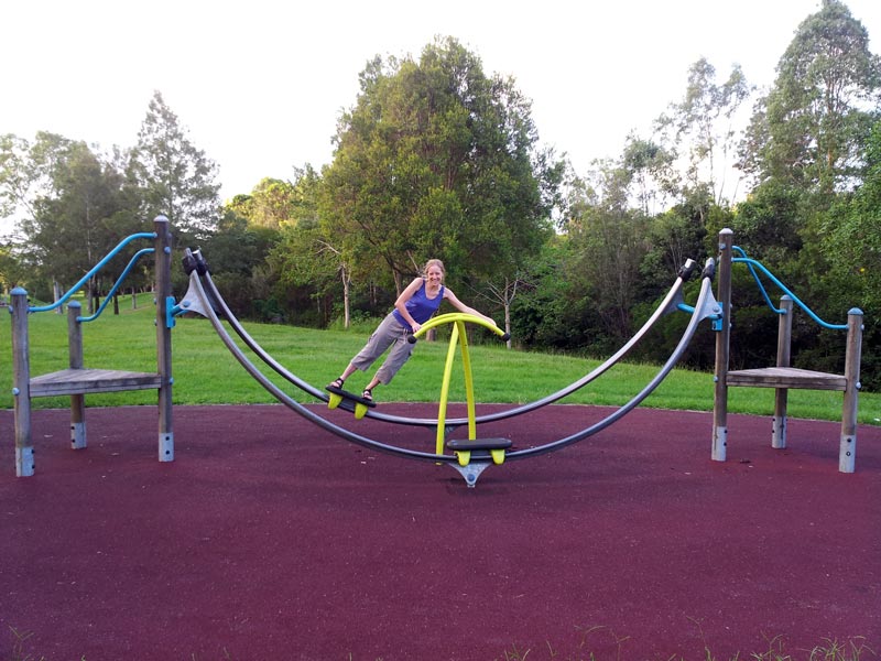 Bronwen testing some unusual exercise equipment in a nearby park.