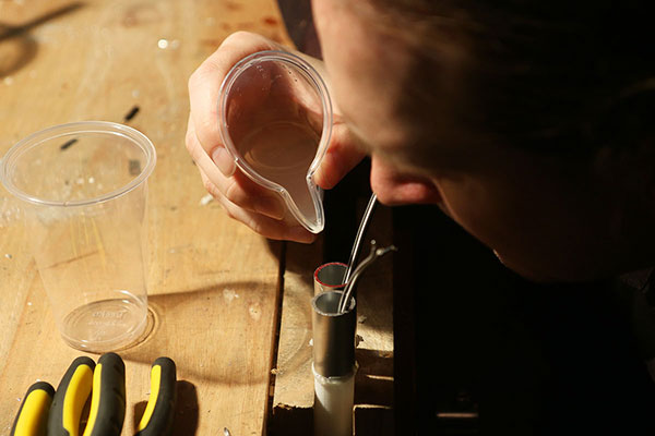 Maz pouring resin into the poi