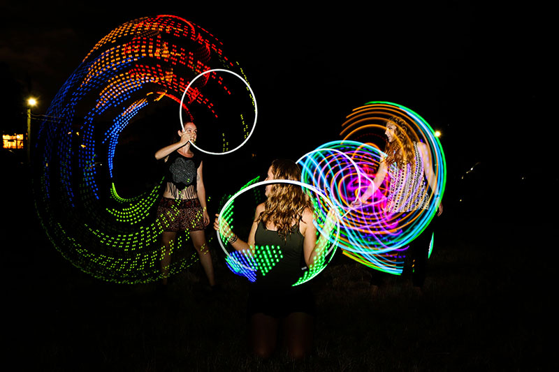 Dee hooping at the West End Fire Festival